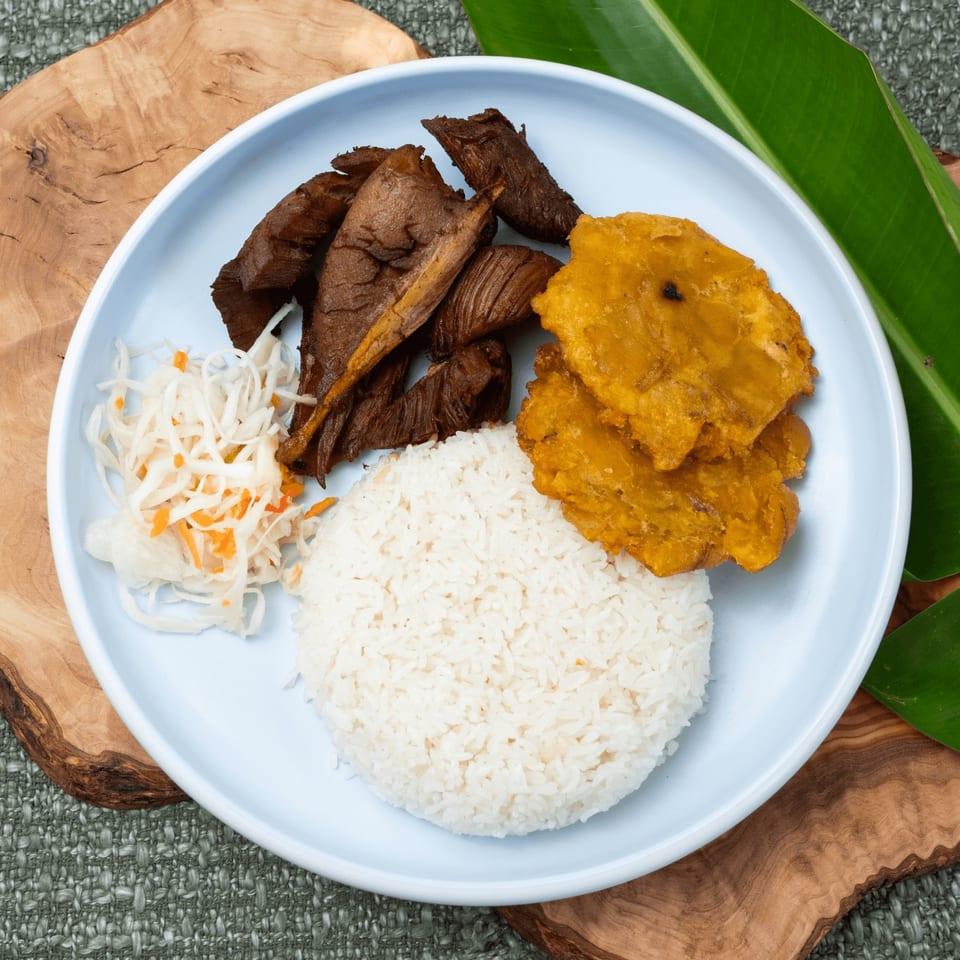 Griot + Rice + Plantains + Pikliz